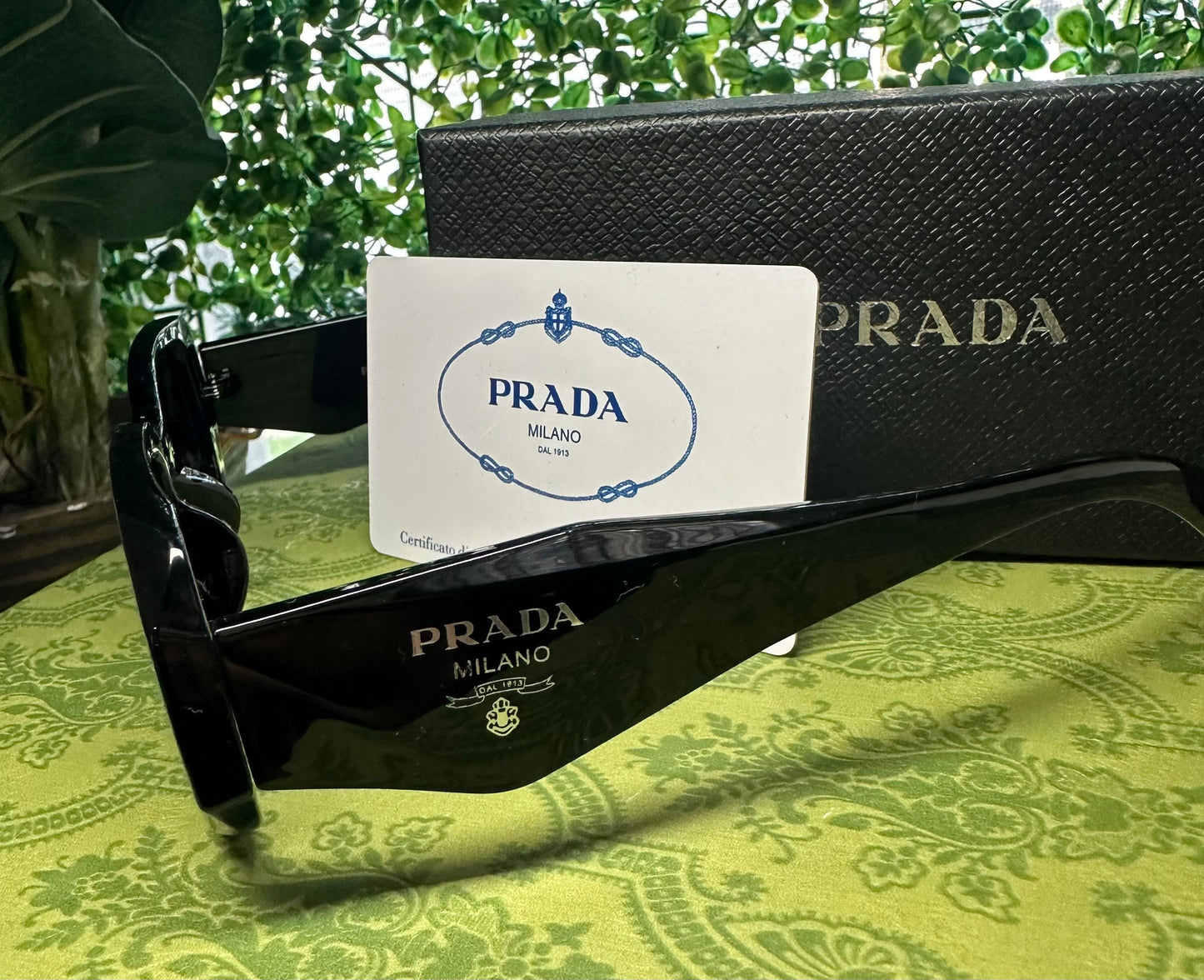 PRADA WOMEN'GLASSES.